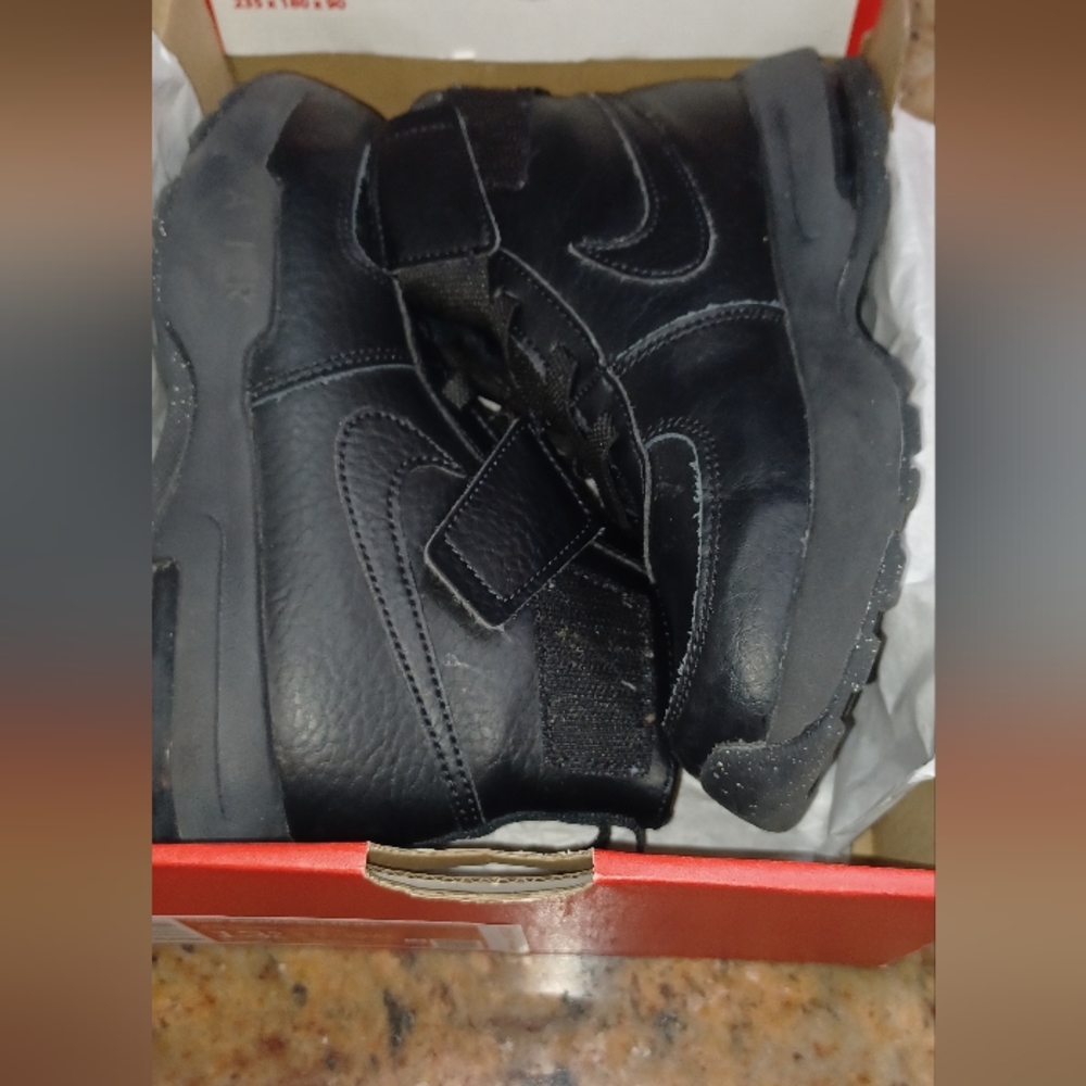 Boys high top Nike boots